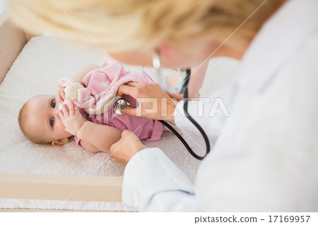 Beautiful cute baby girl with doctor with stethoscope 17169957