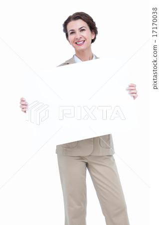 Smiling businesswoman holding blank sign 17170038