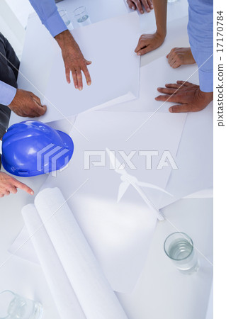 Team of business people looking at construction plan Team of business people looking at construction plan 17170784