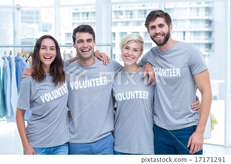 Happy volunteers friends smiling to the camera 17171291