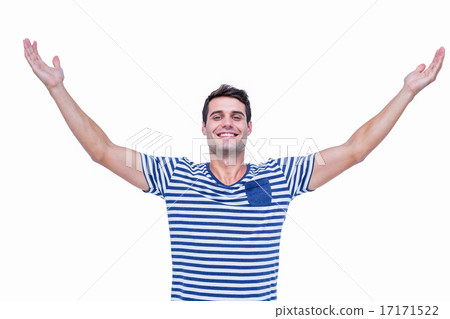 Handsome hipster smiling at camera with arms outstretched Handsome hipster smiling at camera with arms outstretched 17171522
