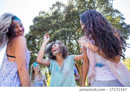 Happy friends covered in powder paint Happy friends covered in powder paint 17172567