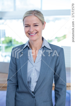 Confident businesswoman in office Confident businesswoman in office 17172570