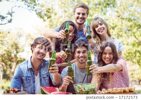 Happy friends in the park having lunch Happy friends in the park having lunch 17172573