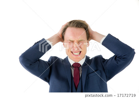 Nervous businessman looking at camera with hand on head 17172719