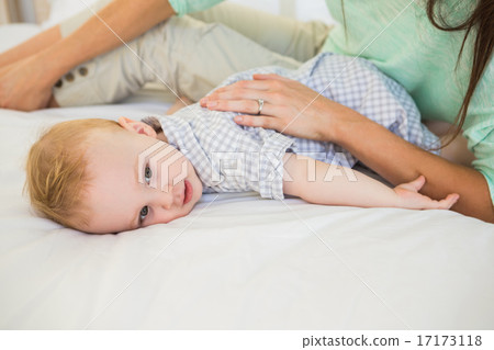 Happy mother with her baby boy 17173118