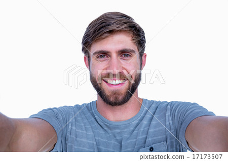 Handsome man smiling at camera Handsome man smiling at camera 17173507