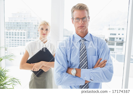 Business partners looking at camera 17174387