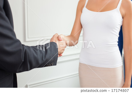 Successful young woman and man are greeting each other 17174807