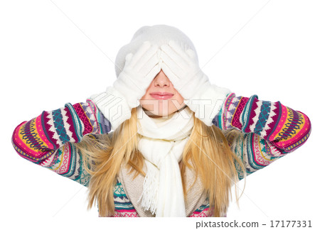 Happy young woman in winter clothes closing eyes Happy young woman in winter clothes closing eyes 17177331