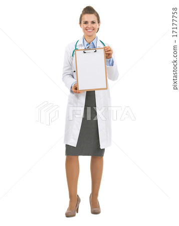 Full length portrait of doctor woman showing blank clipboard Full length portrait of doctor woman showing blank clipboard 17177758