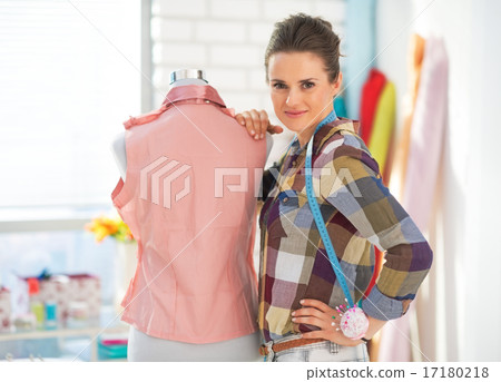 Portrait of happy seamstress with mannequin Portrait of happy seamstress with mannequin 17180218