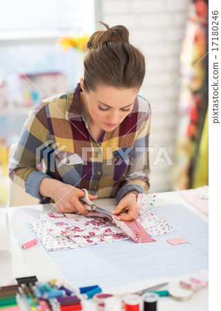Seamstress working in studio Seamstress working in studio 17180246