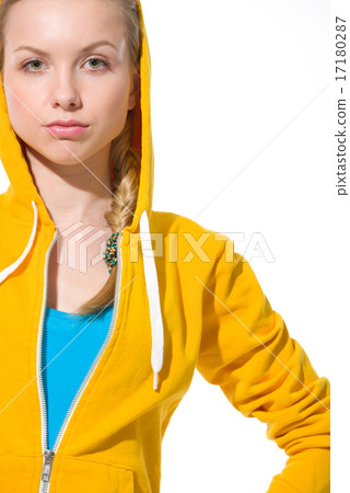 Modern teenager girl in sweater with draped hood 17180287