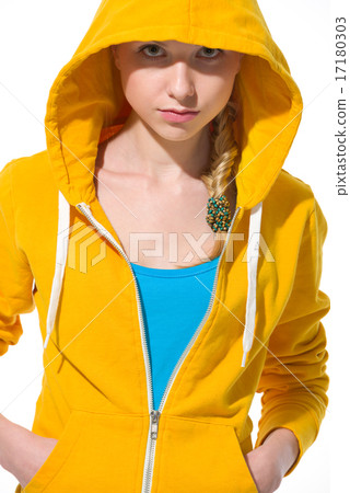 Portrait of modern teenager girl in sweater with draped hood Portrait of modern teenager girl in sweater with draped hood 17180303