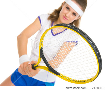 Happy female tennis player in stance Happy female tennis player in stance 17180419
