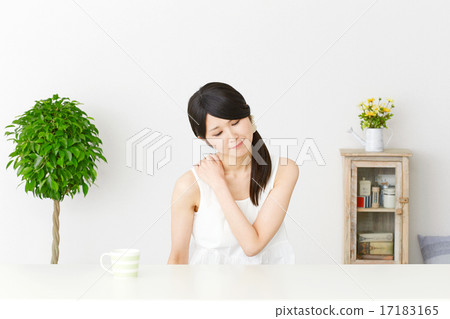 A woman with stiff shoulders 17183165
