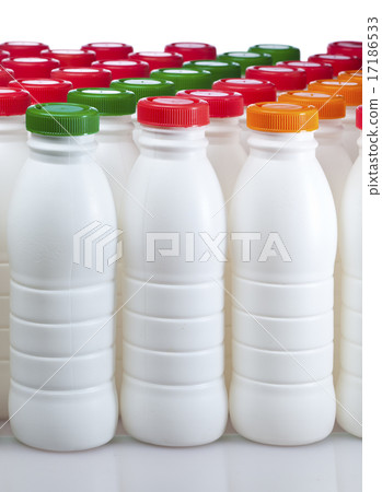 dairy products bottles with bright covers 17186533