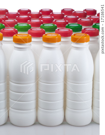 dairy products bottles with bright covers 17186541