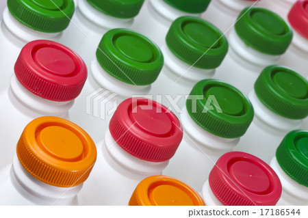 dairy products bottles with bright covers 17186544