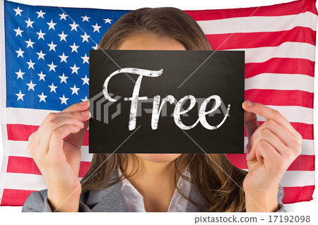 Composite image of businesswoman showing card 17192098