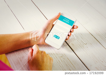 Composite image of woman using smartphone 17192099