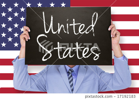 Composite image of businessman showing board 17192183