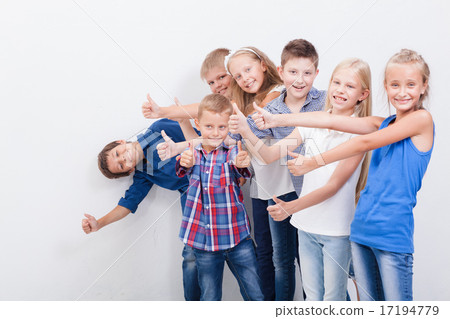 The smiling teenagers showing okay sign on white The smiling teenagers showing okay sign on white 17194779