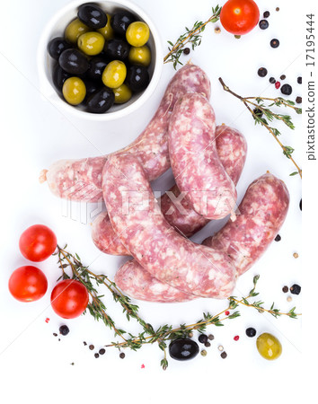 uncooked raw sausages with serving spices uncooked raw sausages with serving spices 17195444