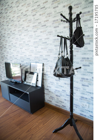 Clothes hang on a shelf in a designer clothes 17195785