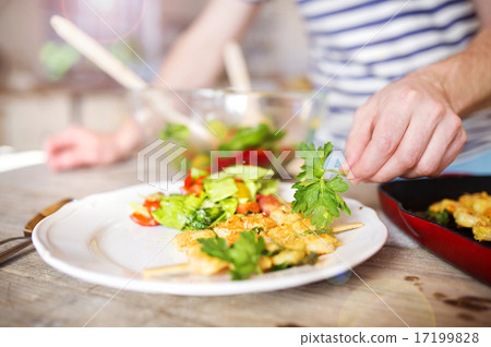 Man serving food Man serving food 17199828