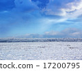 snow field on a winter day with beautiful clouds 17200795