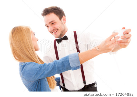 Young hipster couple making a selfie 17204882