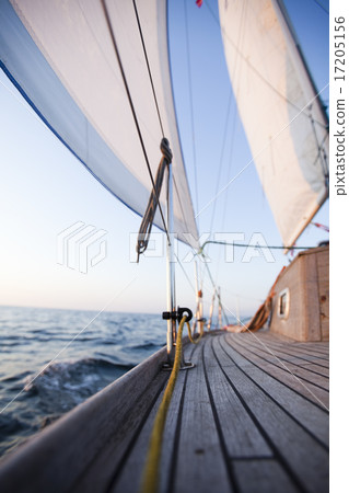 Sailing to the sunrise, summertime saturated  17205156