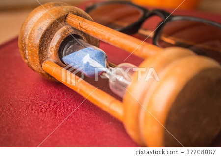Hourglass on the desk 17208087