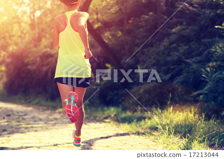 Runner athlete running on forest trail. Runner athlete running on forest trail. 17213044