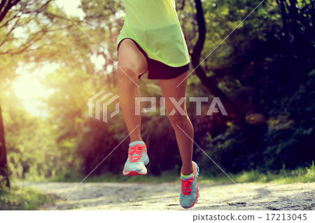 Runner athlete running on forest trail. Runner athlete running on forest trail. 17213045