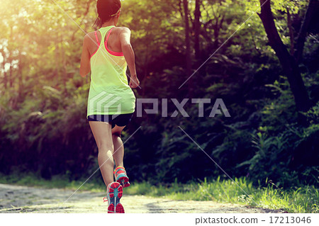 Runner athlete running on forest trail. Runner athlete running on forest trail. 17213046
