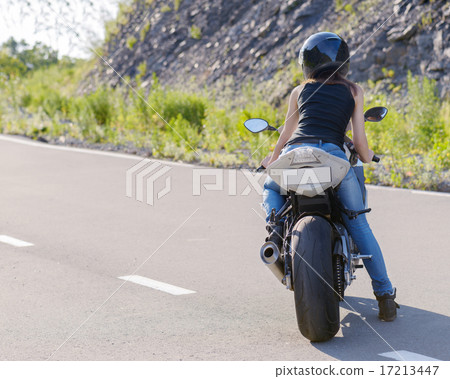 Blonde girl rides on modern motorcycle. Blonde girl rides on modern motorcycle. 17213447