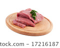 Meat on a cutting board on white background. 17216187