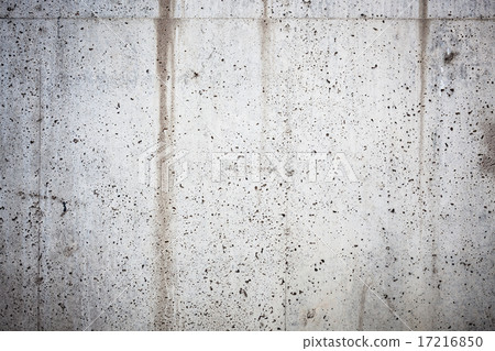 Holey concrete wall background 17216850