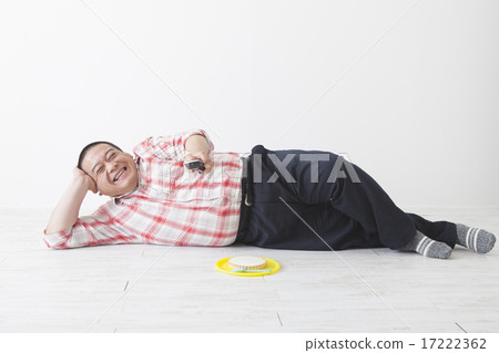 Middle-aged men lying down 17222362