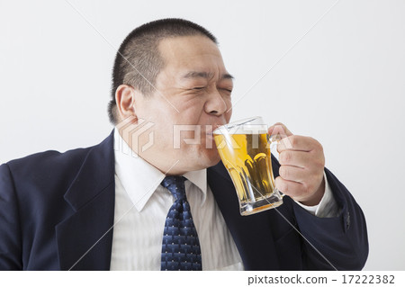 Middle-aged man wearing a suit Middle-aged man wearing a suit 17222382