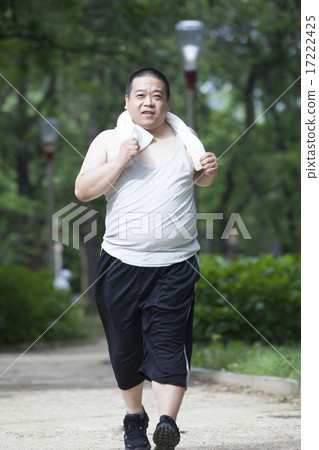 Middle-aged men exercising in the park Middle-aged men exercising in the park 17222425
