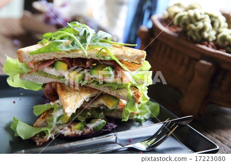 Sandwiches with meet and vegetables on wood background 17223080