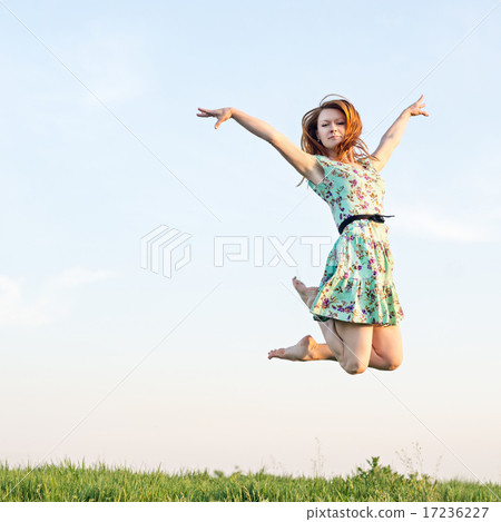 Happy Young Woman Jumping Happy Young Woman Jumping 17236227