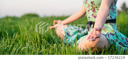 Pretty woman meditate in the park Pretty woman meditate in the park 17236229