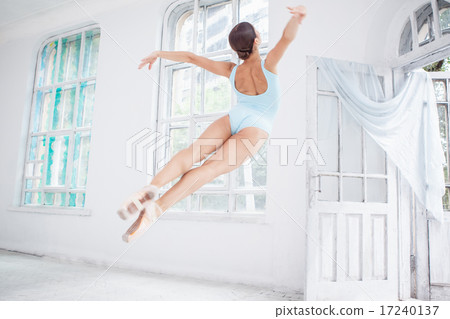 young modern ballet dancer jumping on white background young modern ballet dancer jumping on white background 17240137