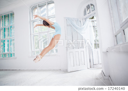 young modern ballet dancer jumping on white background young modern ballet dancer jumping on white background 17240140