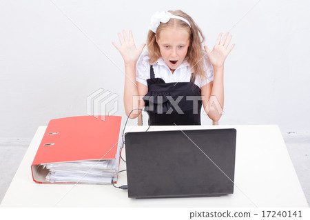 Girl using his laptop computer 17240141